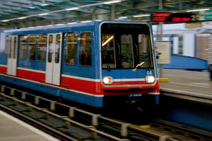 Fast Moving Train at a Railway Station