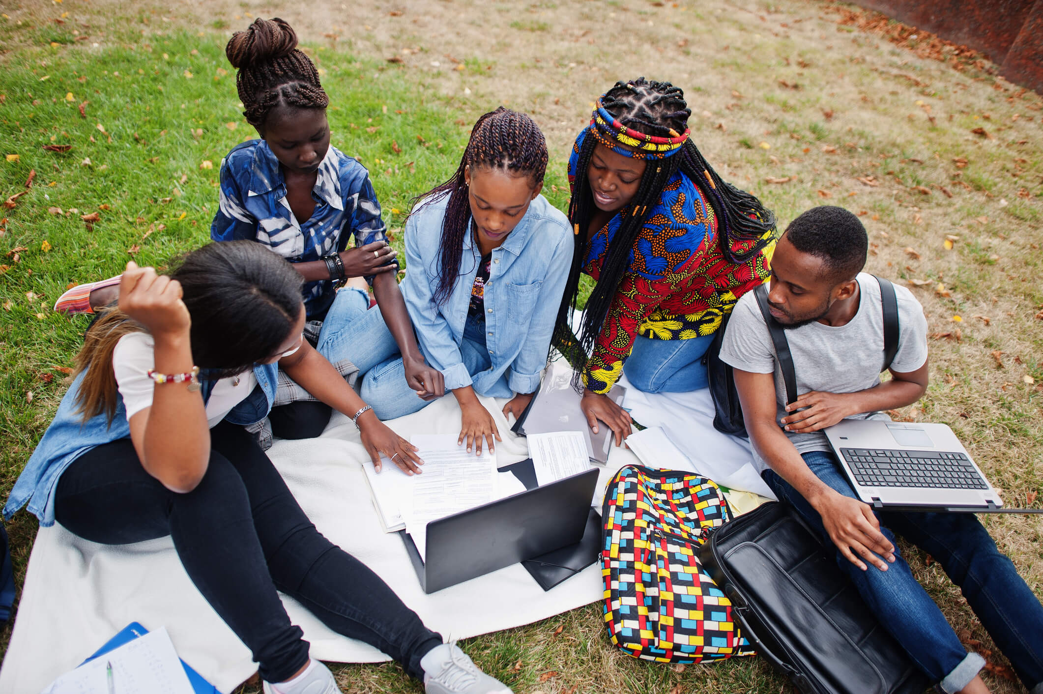 group-of-five-african-college-students-spending-time-together-on-campus-compressed